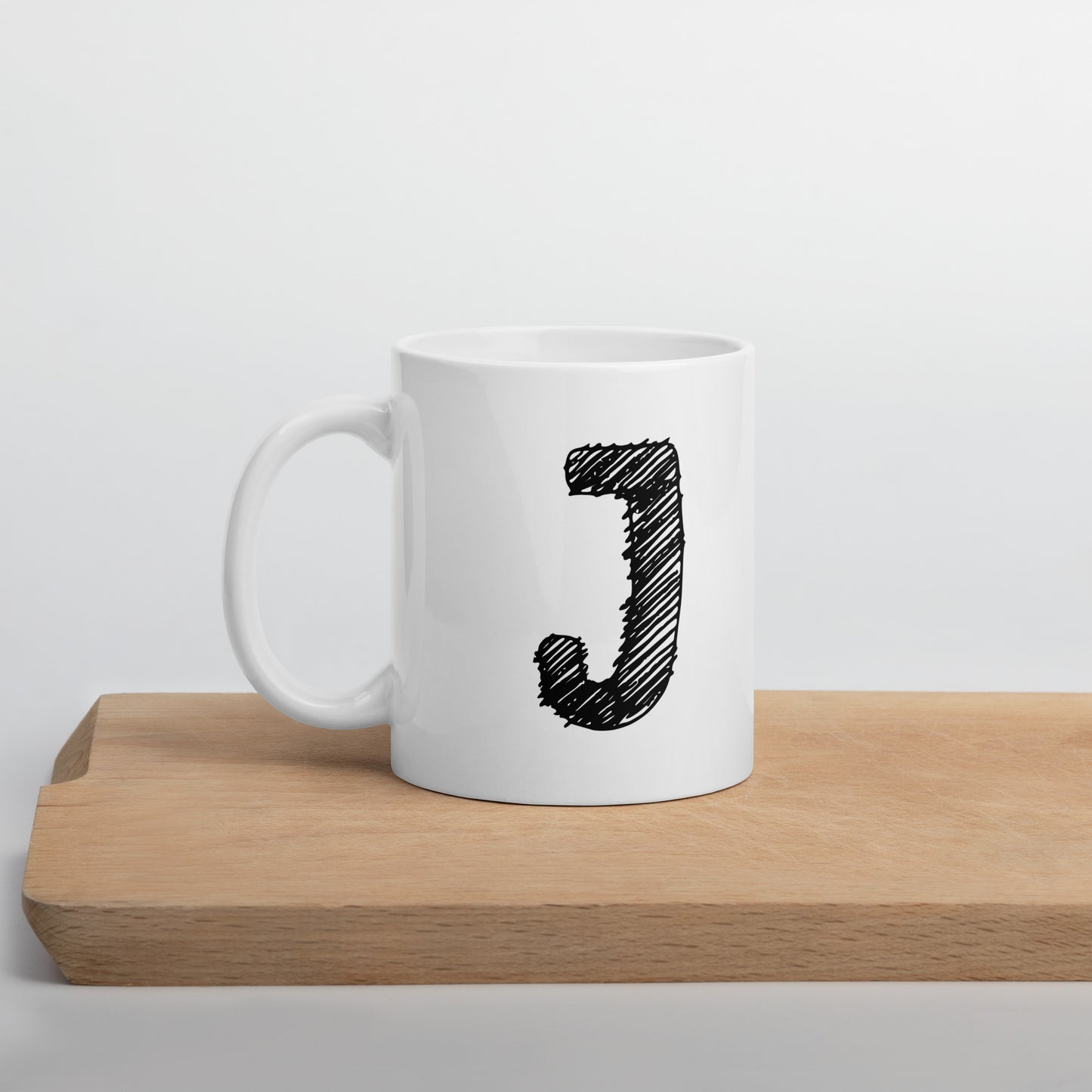 NEOKLASSISCHER BUCHSTABEN "J" Weiße, glänzende Tasse